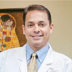 Dr. Carlos J. Jurado, Ph.D., M.D.